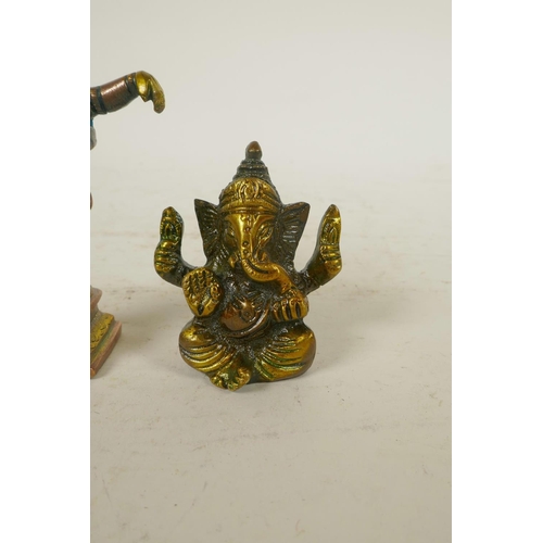 6 - An Indian brass figure of Ganesh and another similar, 4½