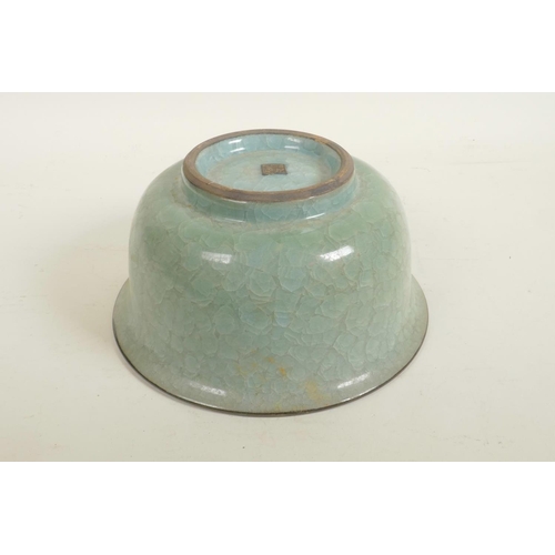 60 - A Chinese celadon crackle glazed porcelain bowl, raised seal mark to base, 8½