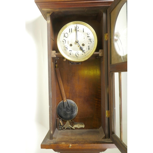 605 - A 1930s German mahogany wall clock with a violin movement striking on a gong, 13