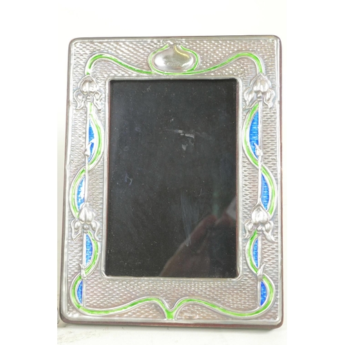 609 - A pair of Art Nouveau style sterling silver photo frames with blue and green enamelled decoration, a... 