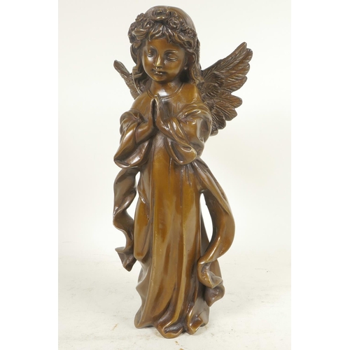 61 - A cast bronze figure of a praying angel, 12