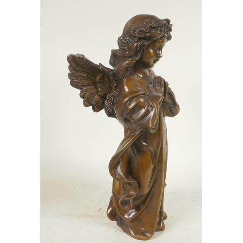 61 - A cast bronze figure of a praying angel, 12