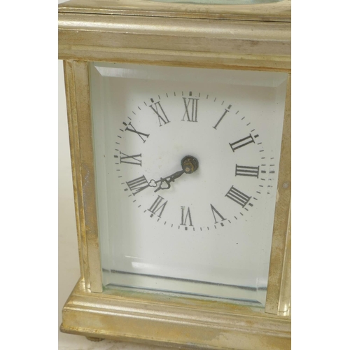 612 - A silver plated carriage clock with white enamelled dial and Roman numerals, comes with key, 3¼