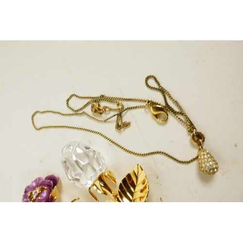 614 - Two Swarovski 'Rose' crystal and gilt flower brooches, a Swarovski pendant, and a micro-mosaic trink... 