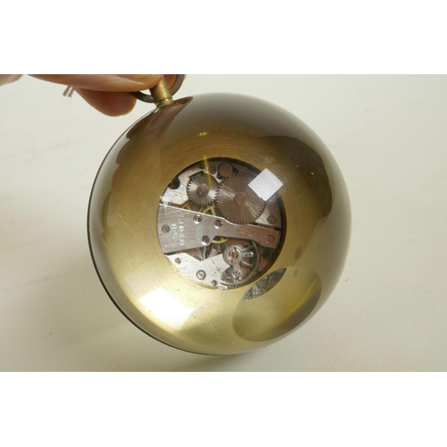 615 - A glass ball desk, brass bound, clock, 3