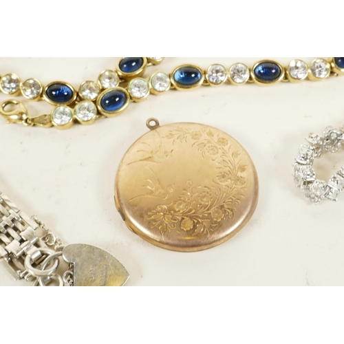 616 - A hallmarked silver gate bracelet, a gold front and back locket, and other costume jewellery