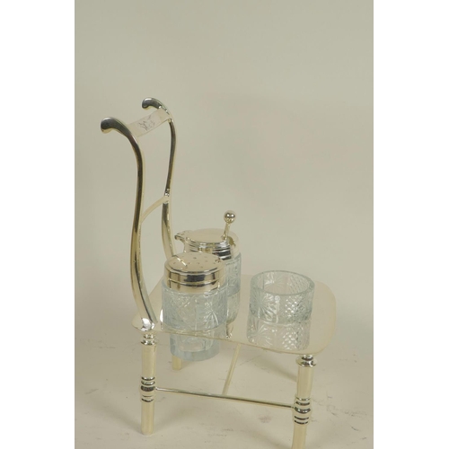 619 - A silver plated cruet, the stand in the form of a bar back chair, 8