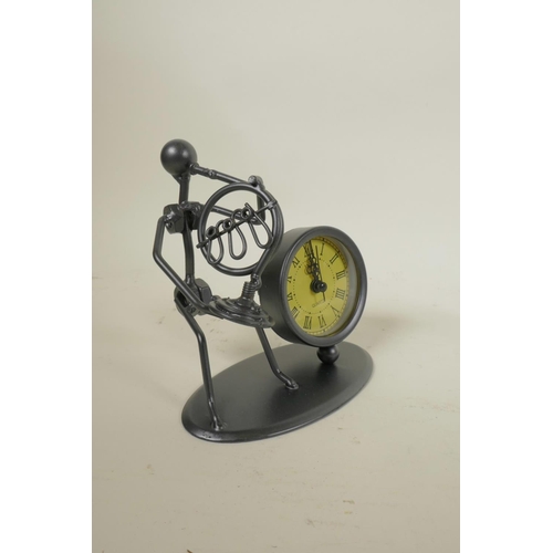 633 - A set of three metal figural desk clocks in the form of musicians, 4½