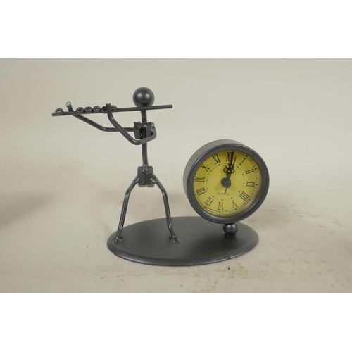 633 - A set of three metal figural desk clocks in the form of musicians, 4½