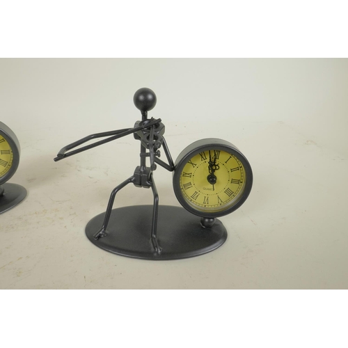 633 - A set of three metal figural desk clocks in the form of musicians, 4½