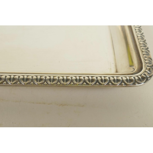 642 - A hallmarked silver tray from the Goldsmiths and Silversmiths Company, London, 11