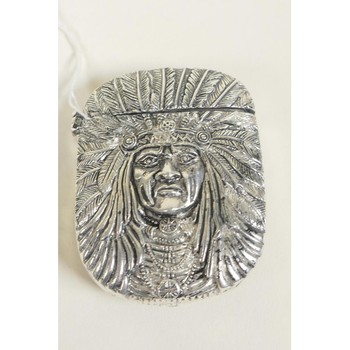 652 - A silver plated vesta case decorated with a Native American brave, 2