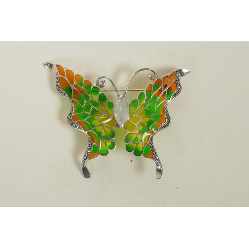 657 - A 925 silver plique a jour brooch in the form of a butterfly, and a Chinese white metal pendant with... 