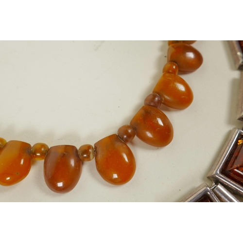 659 - An amber beaded necklace, and a silver and faux amber bracelet, 16