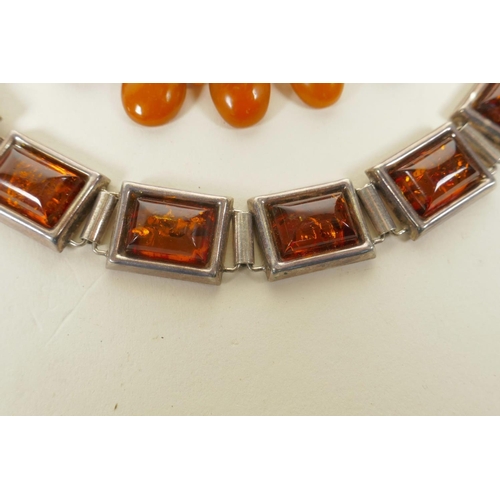 659 - An amber beaded necklace, and a silver and faux amber bracelet, 16