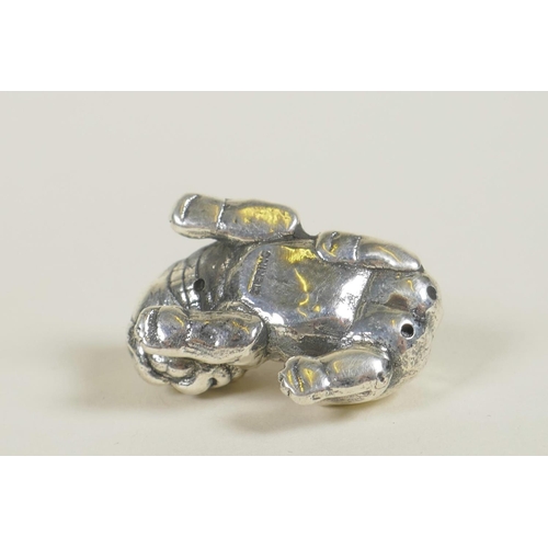 668 - A sterling silver pincushion in the form of a pug/bulldog, 1