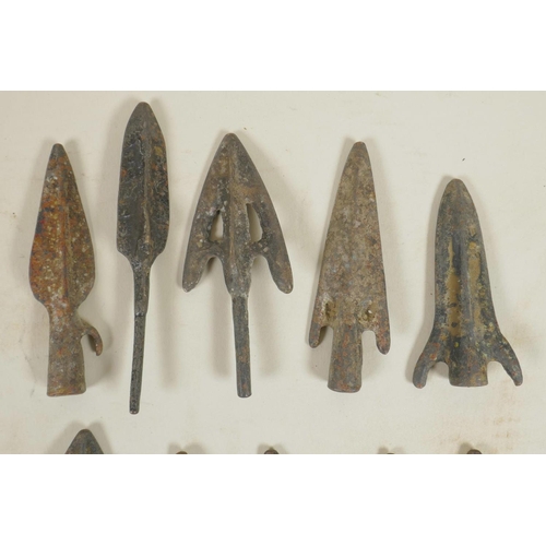 67 - A collection of ten archaic bronze arrowheads, 3½