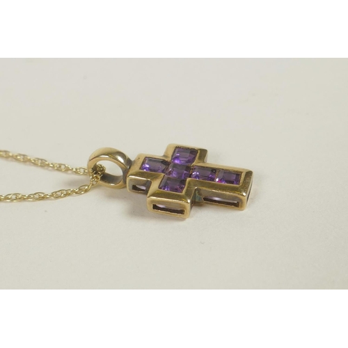 689 - A 9ct yellow gold and amethyst set crucifix pendant necklace, ¾