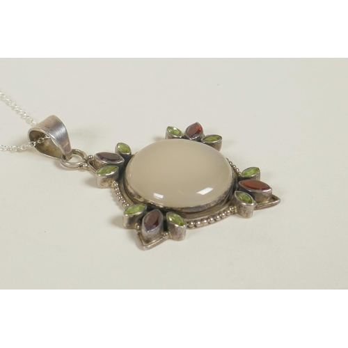 692 - A silver pendant necklace set with a large moonstone, tourmaline and garnets, 3