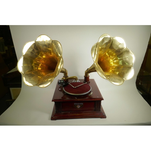 7 - A replica twin horn wind up gramophone with brass horn, 17