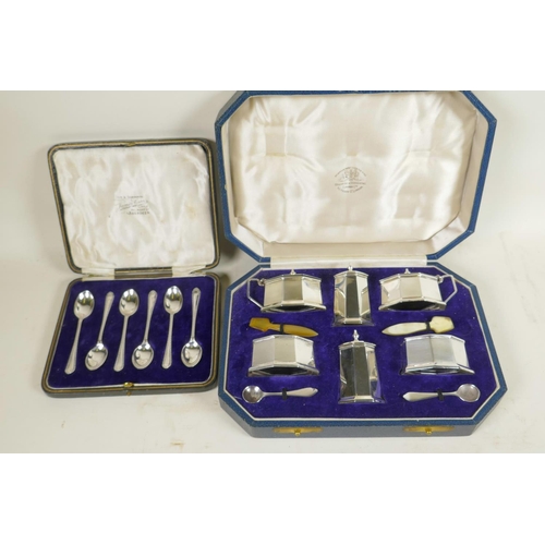 712 - A cased six piece hallmarked silver cruet set from the Goldsmiths and Silversmiths Company, hallmark... 