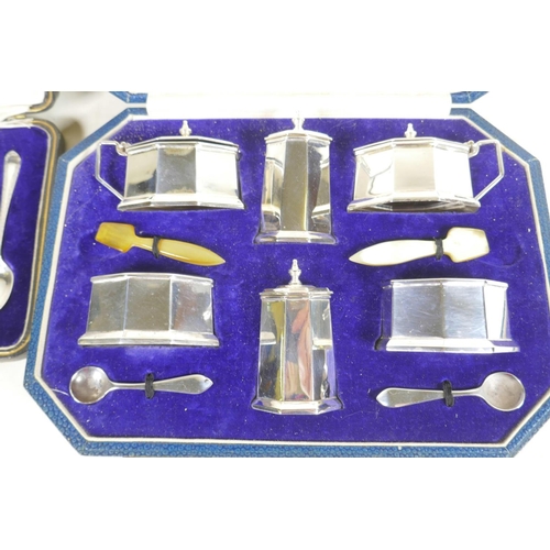 712 - A cased six piece hallmarked silver cruet set from the Goldsmiths and Silversmiths Company, hallmark... 