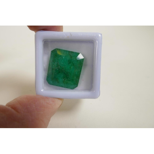 717 - An 18.55ct natural emerald, octagon step cut, colour enhanced, certified by Gemological Laboratory o... 