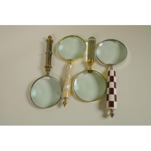 72 - Four desk top magnifying glasses with glass, brass and shell handles, 10