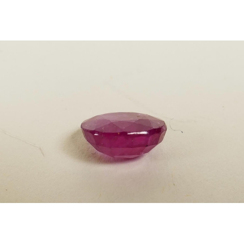 723 - A 4.90ct translucent natural ruby, oval cut, glass filled, colour enhanced, certified, with certific... 