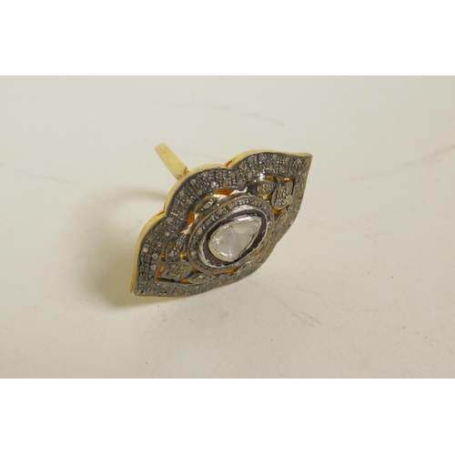 725 - A silver gilt dress ring of diamond form, set with uncut diamonds