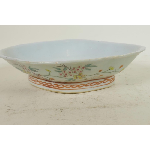 77 - A Chinese lobe shaped porcelain dish painted with flowers and berries in bright enamels, 10