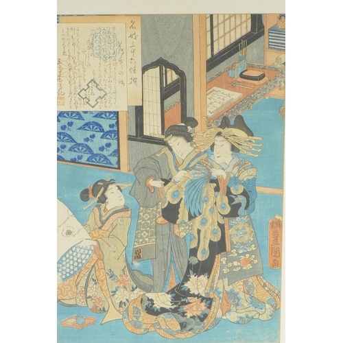 884 - A Japanese colour print of three ladies with script, panel 8½