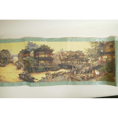 89 - A Chinese printed scroll depicting an extensive cityscape with waterways, main image 51