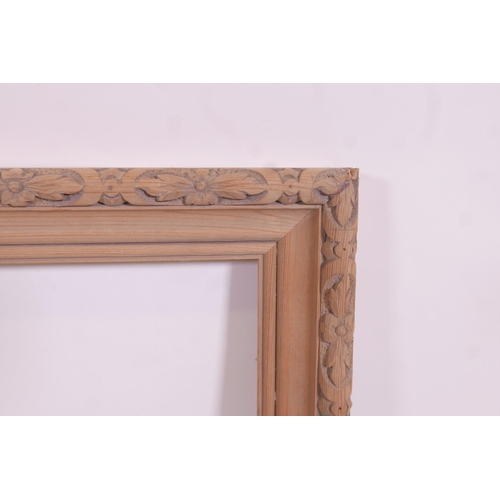 918 - A Continental carved pine frame, 16¼