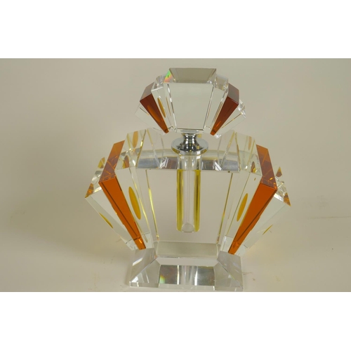 93 - An Art Deco style clear and amber glass perfume bottle, 9