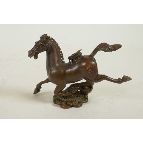 98 - A Jizai style bronze figure of a horse, impressed mark to base, 2½