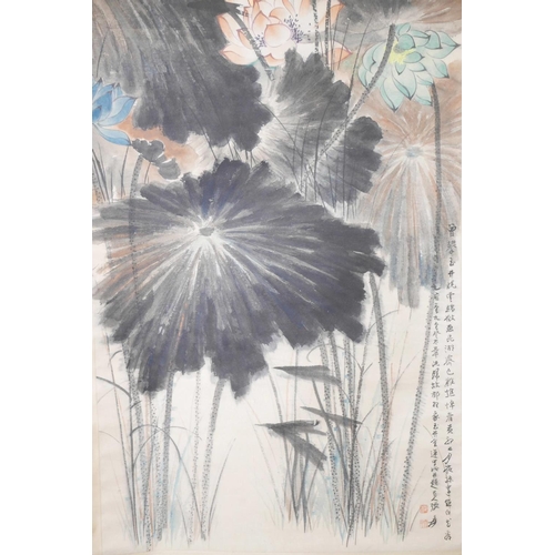 13 - A Chinese watercolour scroll decorated with multicoloured lotus flowers, 25