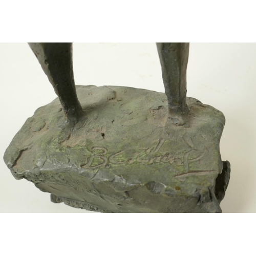 23 - A modernist bronze standing figure on a block plinth base, 17