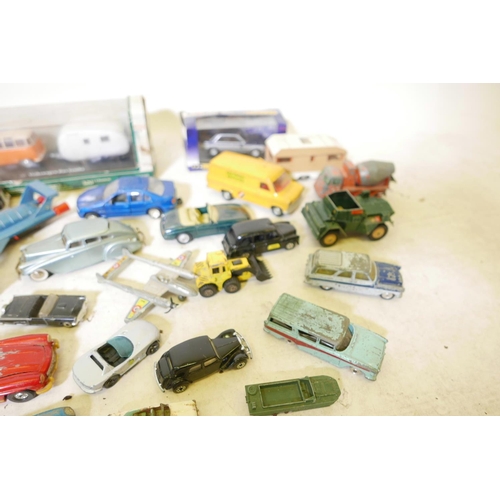 24 - A collection of die cast model vehicles including Dinky, Corgi etc