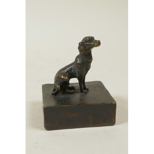 33 - A Chinese bronzed metal seal with a dog knop, 3