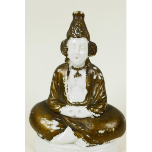 43 - A Continental porcelain pastille burner modelled as a figure seated in meditation, 4