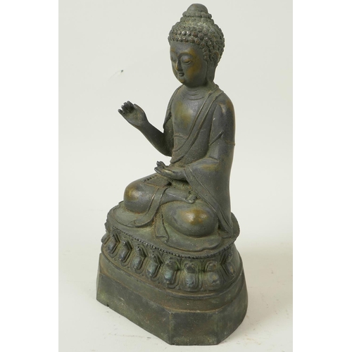 53 - A Chinese bronze figure of Buddha seated in meditation on a lotus throne, seal mark to back, 9