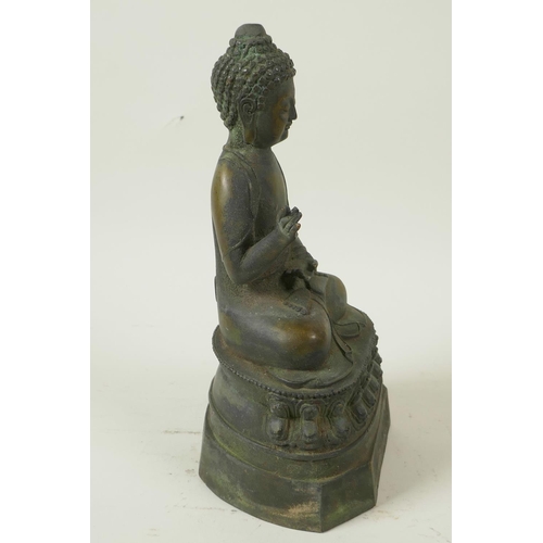 53 - A Chinese bronze figure of Buddha seated in meditation on a lotus throne, seal mark to back, 9