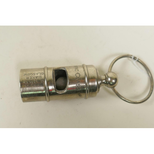 6 - A reproduction silver plated White Star Line whistle, 4