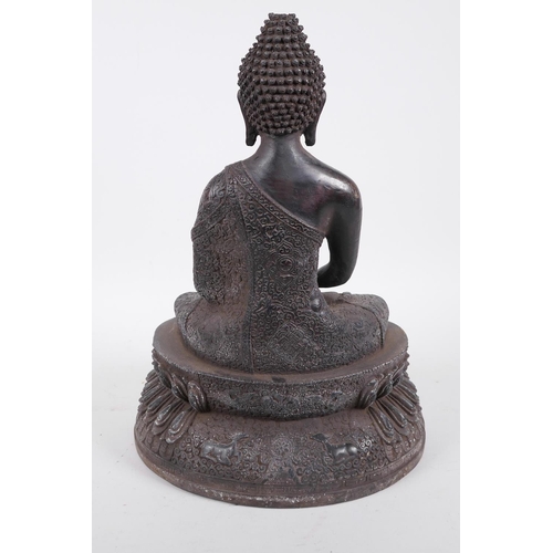 14 - A Chinese bronze figure of Buddha seated in meditation on a lotus throne, holding a small censer, 14... 