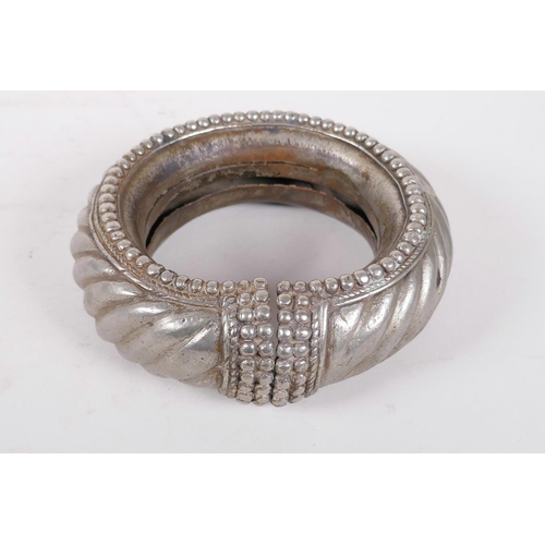 An antique Arabian Omani silvered metal slave anklet manilla 5 diameter