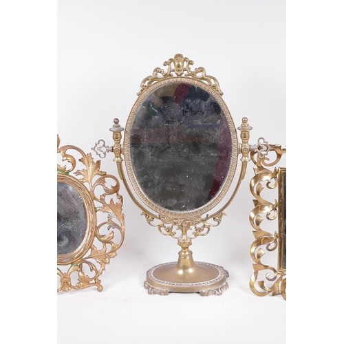 201 - Three gilt metal framed dressing table mirrors, pedestal mirror 15½