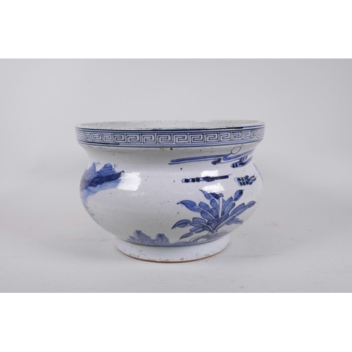 203 - An antique Chinese blue and white porcelain jardiniere decorated with figures in a garden, seal mark... 