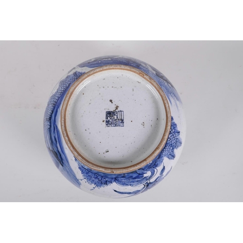 203 - An antique Chinese blue and white porcelain jardiniere decorated with figures in a garden, seal mark... 
