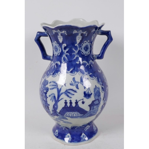 397 - A Chinese two handled blue and white porcelain vase decorated with a variation of the Willow Pattern... 